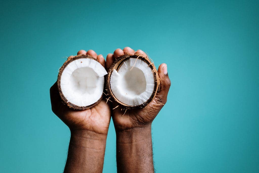 How to Sweeten Coffee Without Sugar: 10 Tasty Alternatives 4 Photo Of Person Holding Coconut
