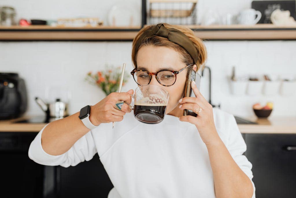 Comparing Drip Coffee vs French Press: What’s Right for You? 1 Woman in White Sweatshirt Drinking Coffee During Phone Call