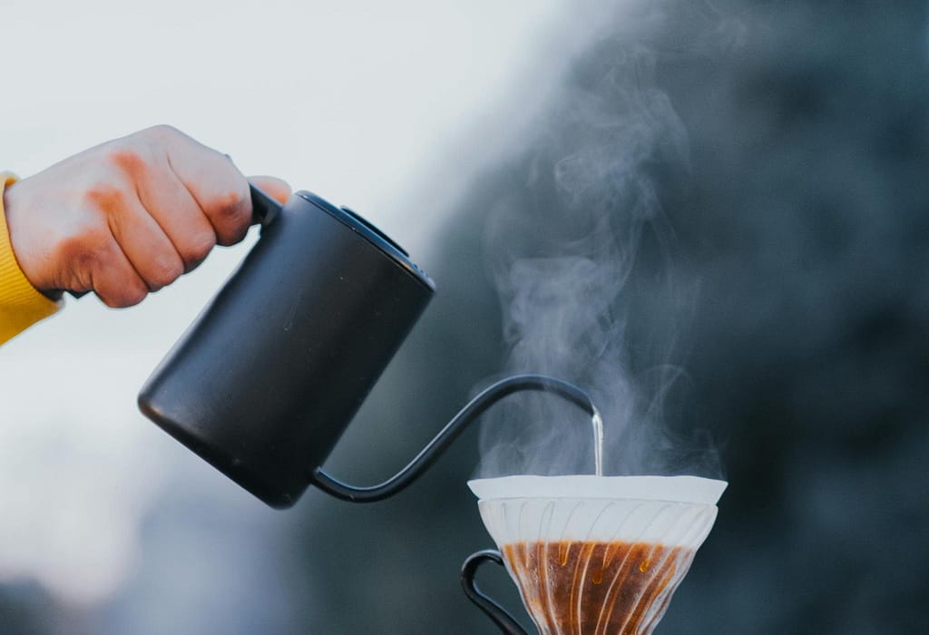 Perfect Your Brew: The Best Temperature to Brew Coffee 3 Preparing Coffee in the Dripper V60